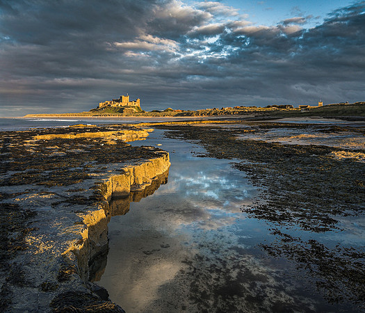 Bamburgh Castle in late evening light, Northumberland, England